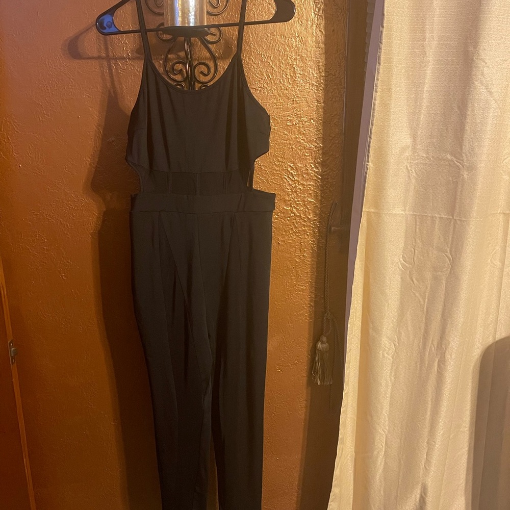 Ladies Xl All black jumpsuit sheer at the legs/ thighs